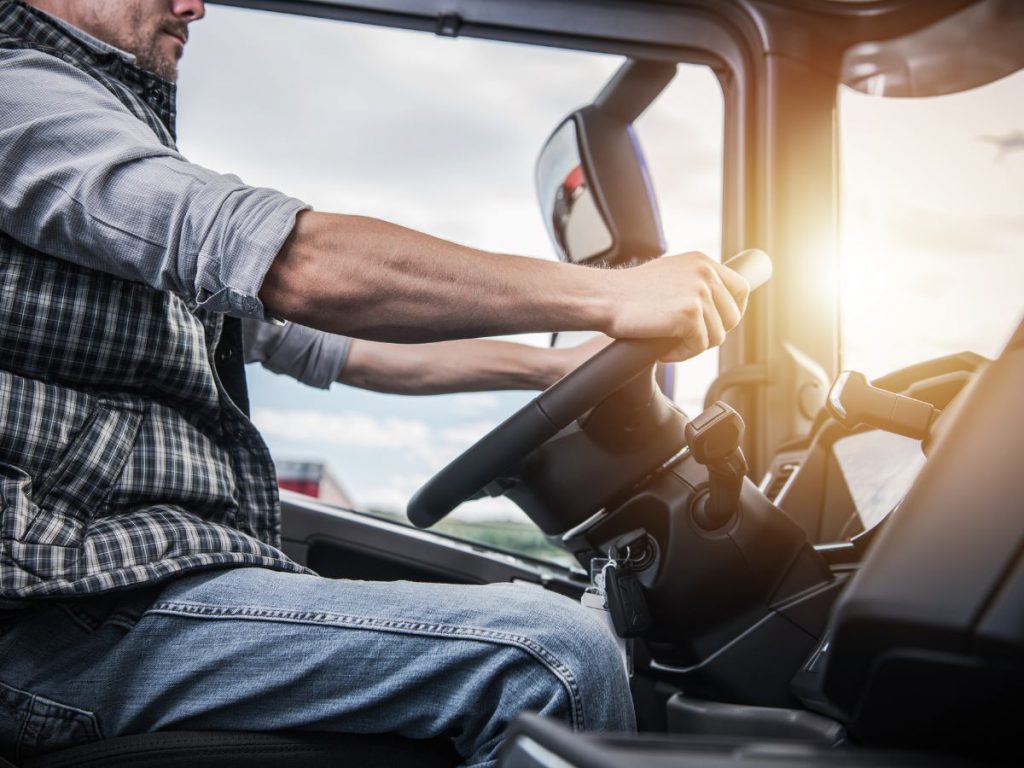 man driving truck with rv trucker gps system