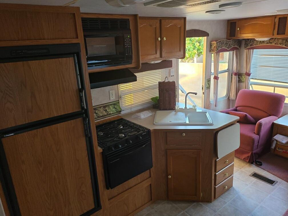 Photo 9 - 2005 Keystone Travel Trailer rental photo 11