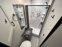 2024_coachmen_freelander_22xg_cny2563926_impel-capture_close-up_bathroom-1.jpg thumbnail 5